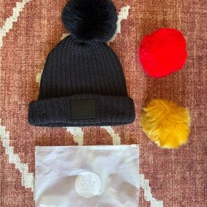 Love Your Melon Black Beanie with Red and Yellow Pom-Poms